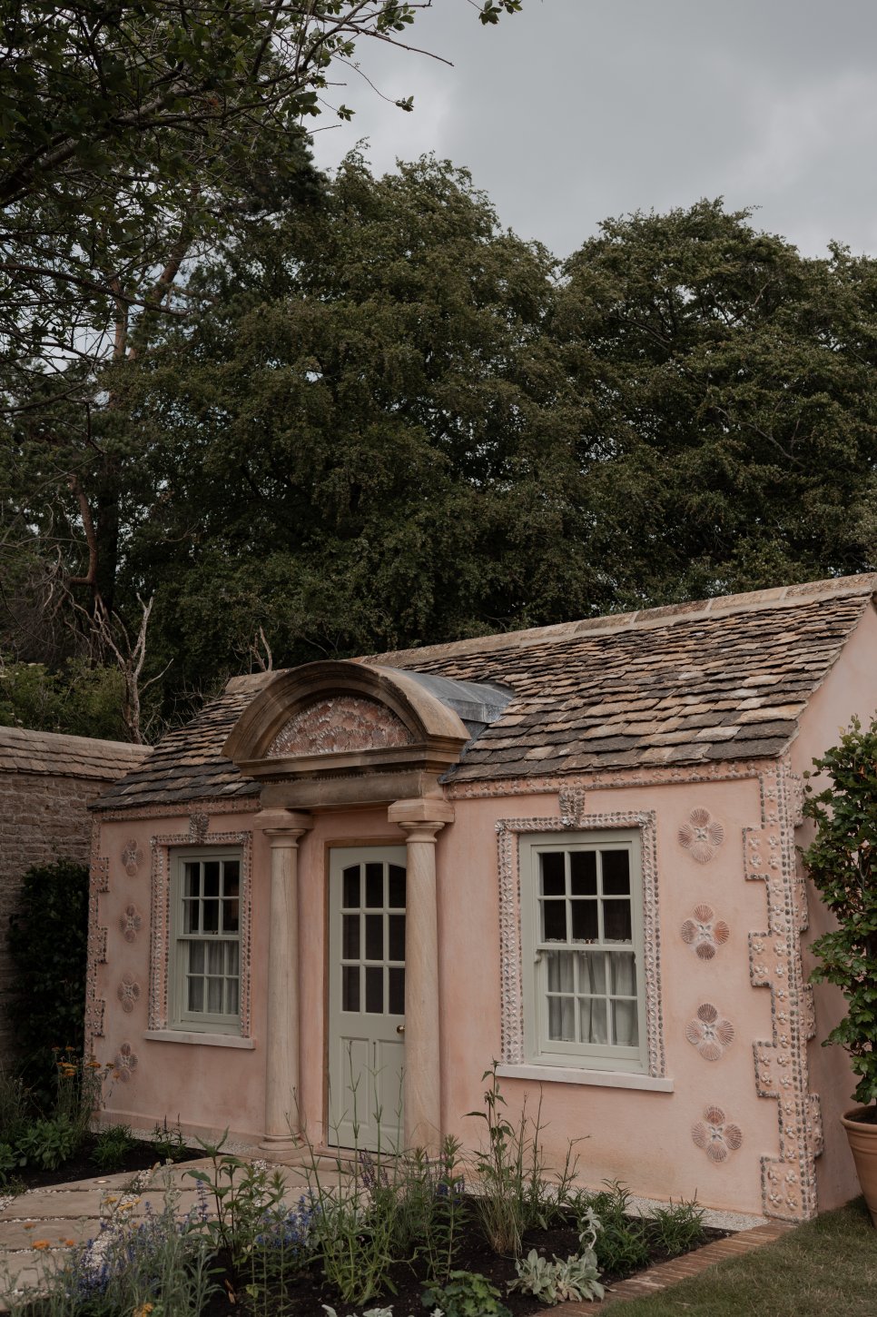 The Chicest New Pool Party Spot in the English Countryside Features a Shell-Encrusted Pink Pool House